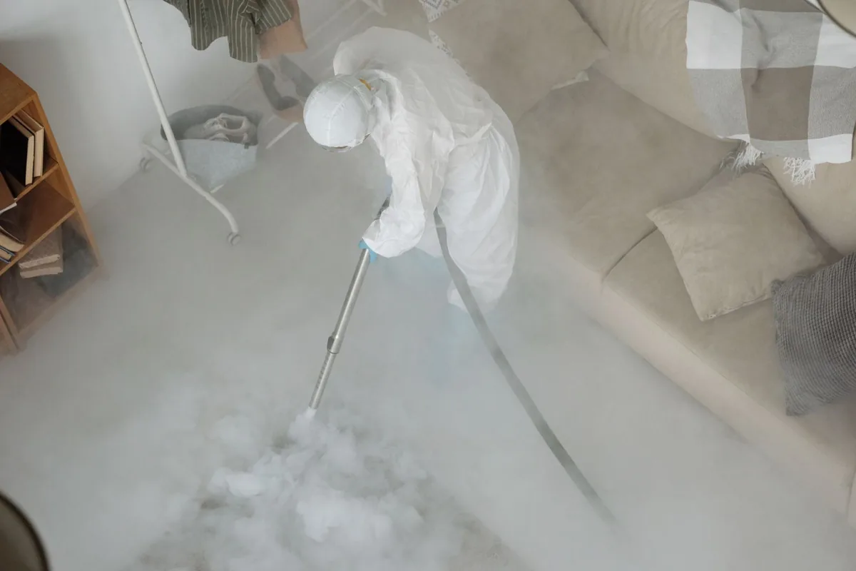 Biohazard cleanup technician in protective equipment, Willacoochee, GA